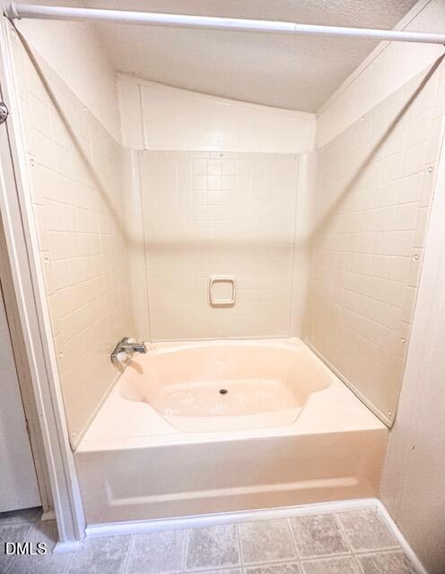 7537 Sam Young Road Oxford, NC 27565 - Photo 25 of 28 a bathroom with a tub