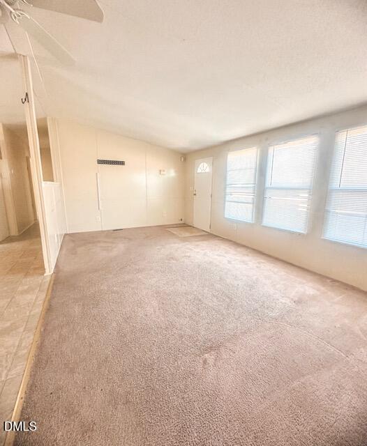 7537 Sam Young Road Oxford, NC 27565 - Photo 8 of 28 an empty room with windows