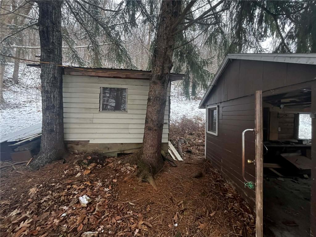 612 State Rte 1031 Templeton, PA 16259 - Photo 24 of 26 a backyard of a house with barbeque oven fire pit and outdoor seating