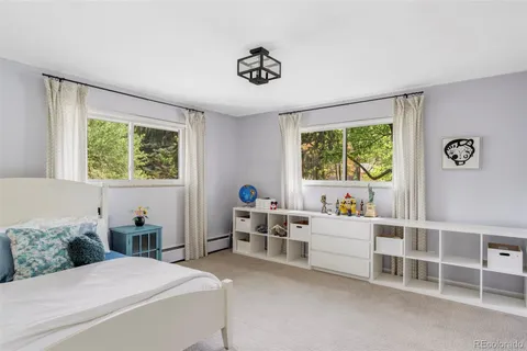a room with a bed and a window