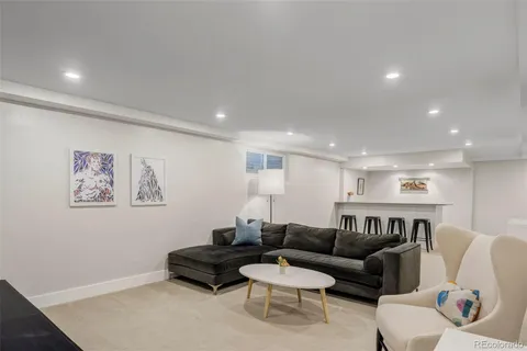 a living room with furniture and a couch