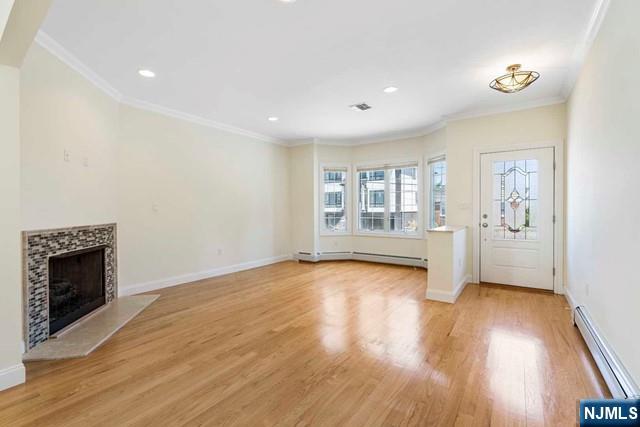212 Slocum Way, Unit A Fort Lee, NJ 07024 - Photo 11 of 30 a view of an empty room with a window and wooden floor