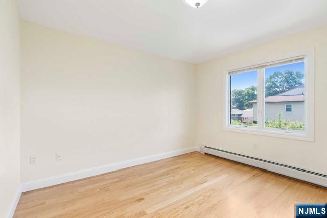 212 Slocum Way, Unit A Fort Lee, NJ 07024 - Photo 20 of 30 an empty room with a window
