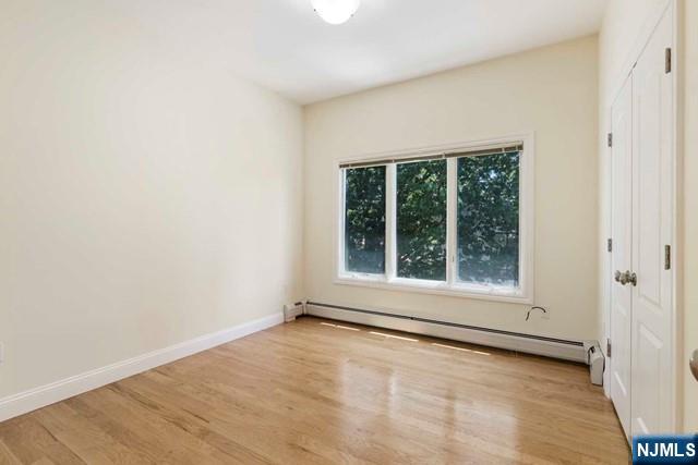 212 Slocum Way, Unit A Fort Lee, NJ 07024 - Photo 21 of 30 a view of an empty room with a window