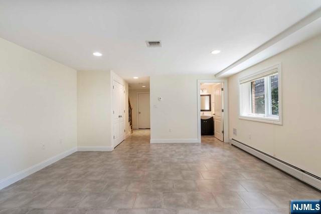 212 Slocum Way, Unit A Fort Lee, NJ 07024 - Photo 26 of 30 a view of an empty room with a window