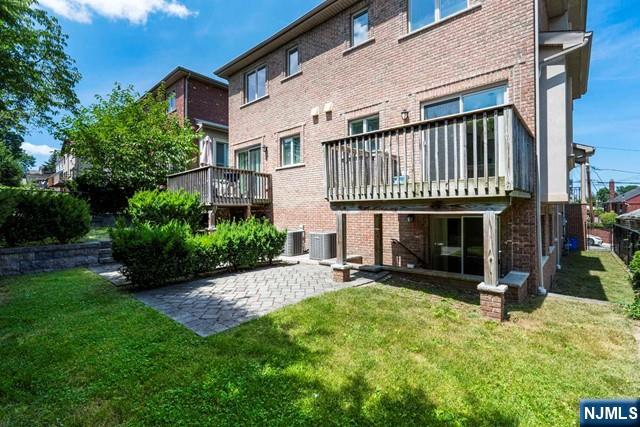 212 Slocum Way, Unit A Fort Lee, NJ 07024 - Photo 30 of 30 a view of an house with backyard and porch
