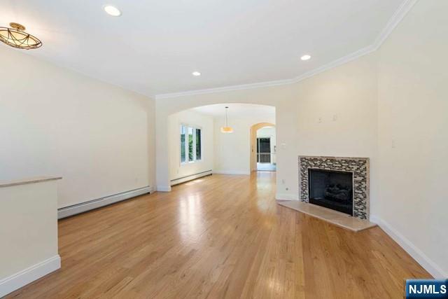 212 Slocum Way, Unit A Fort Lee, NJ 07024 - Photo 4 of 30 an empty room with wooden floor fireplace and windows