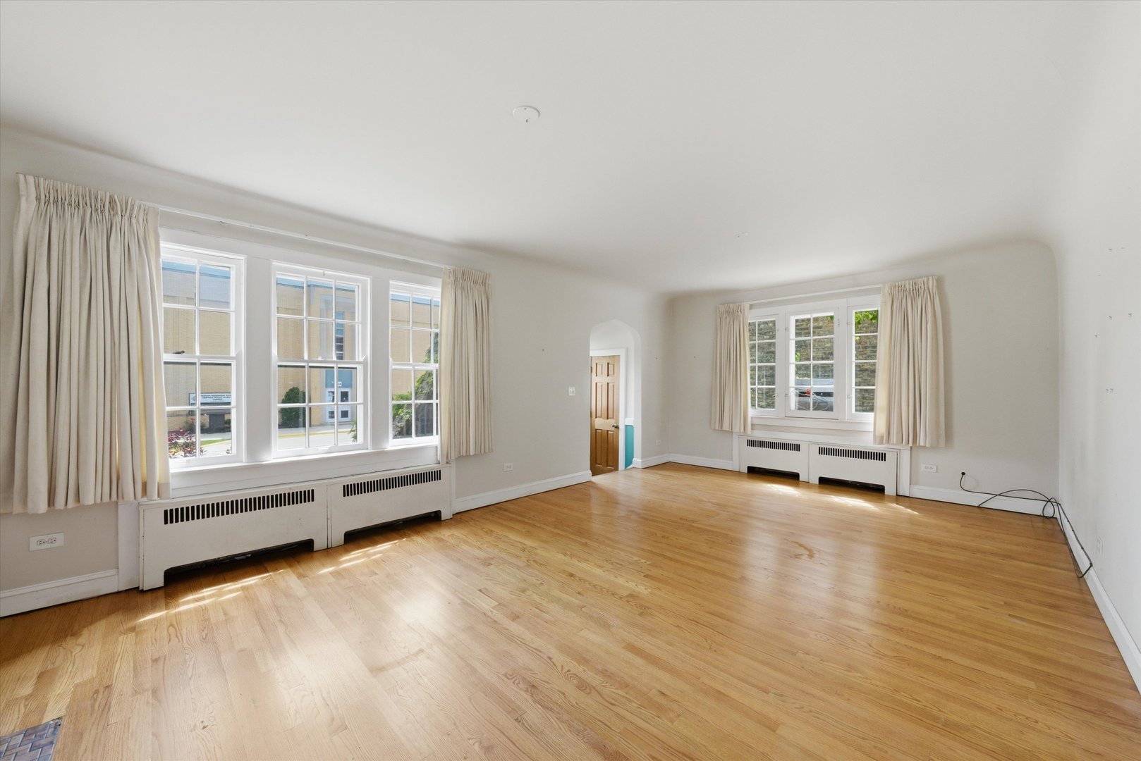 3100 Clinton Avenue Berwyn, IL 60402 - Photo 5 of 25 a view of an empty room with a window