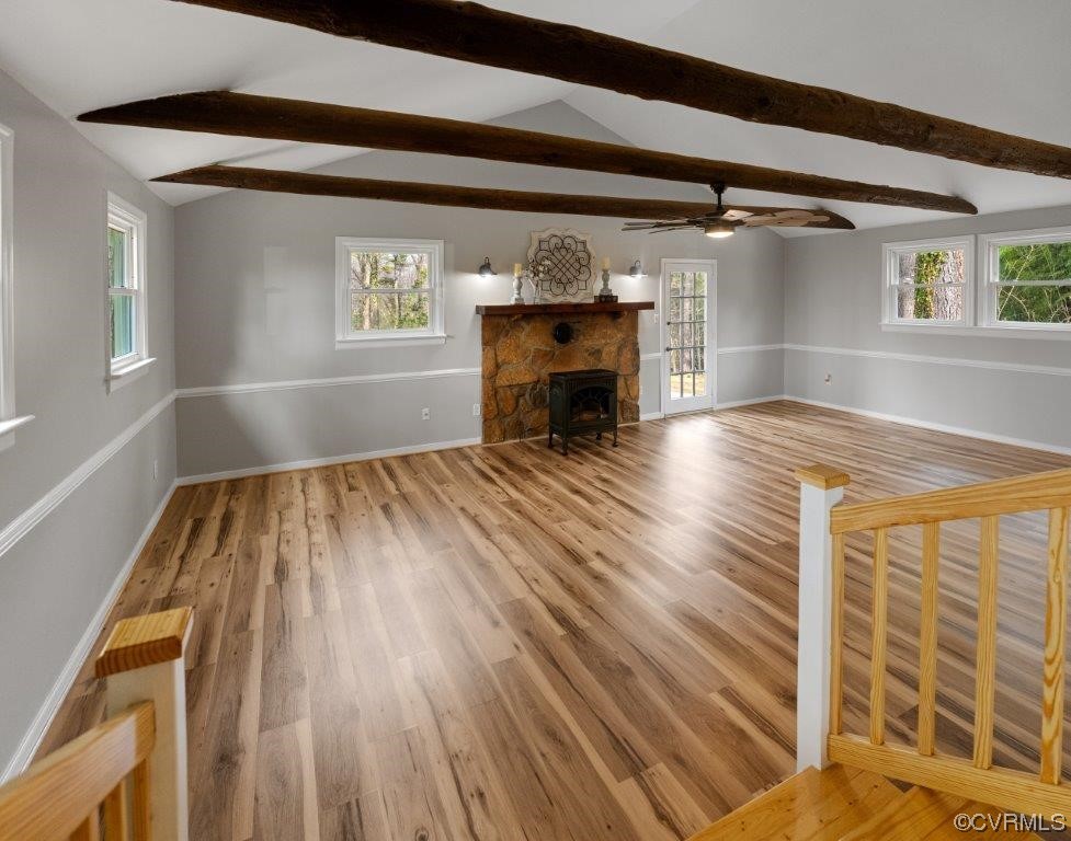 134 Ampthill Road Cartersville, VA 23027 - Photo 23 of 50 a view of empty room with wooden floor and fireplace