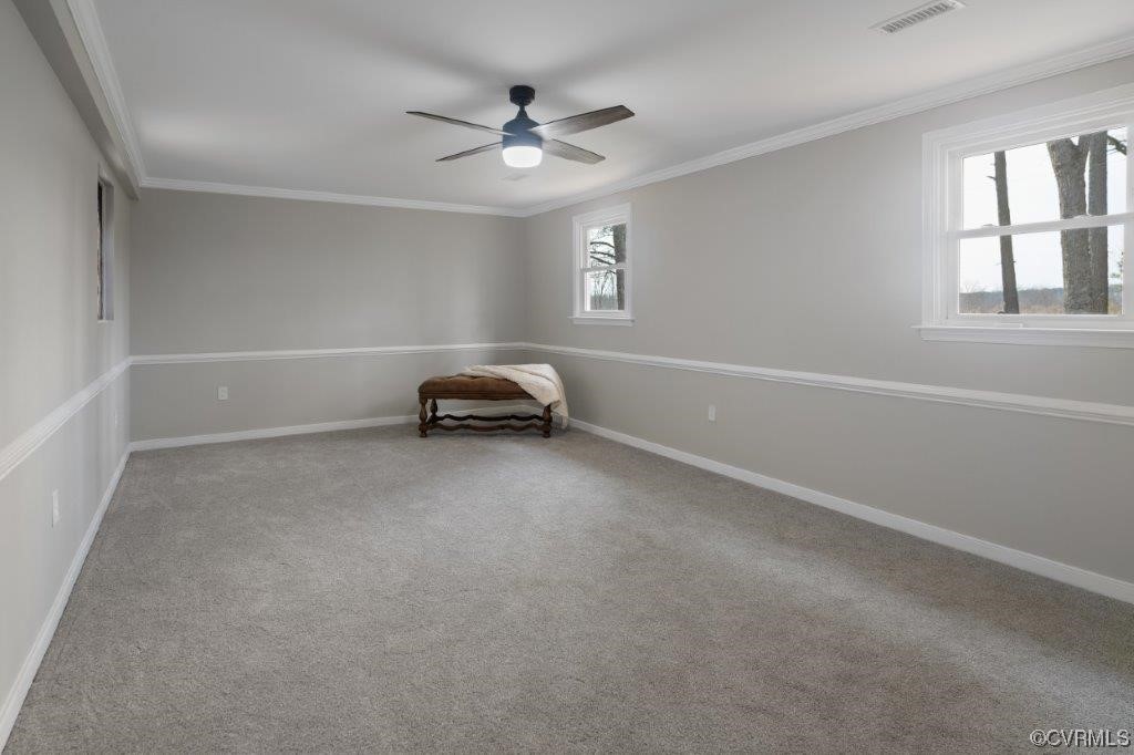 134 Ampthill Road Cartersville, VA 23027 - Photo 26 of 50 a view of a livingroom with a ceiling fan and window