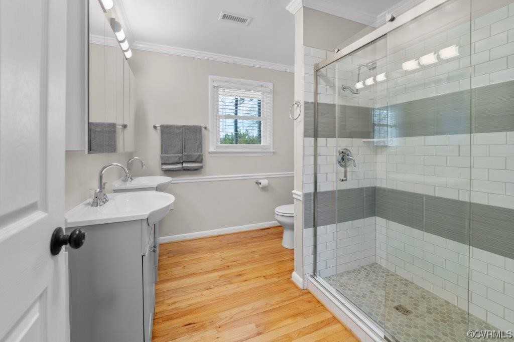134 Ampthill Road Cartersville, VA 23027 - Photo 30 of 50 a bathroom with a sink a mirror and a shower