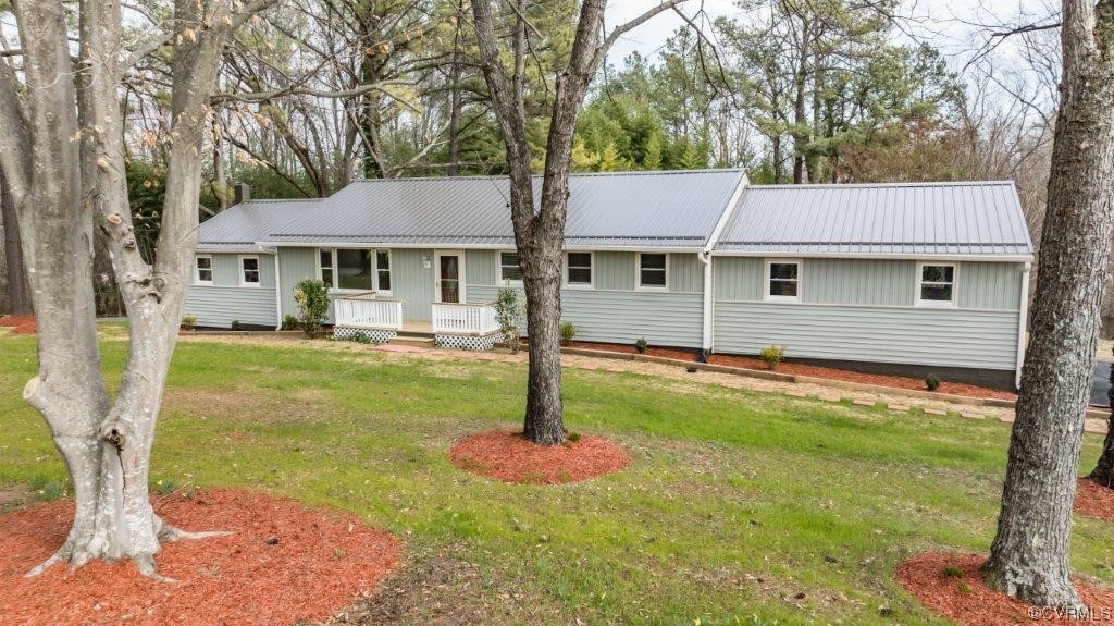 134 Ampthill Road Cartersville, VA 23027 - Photo 3 of 50 a front view of a house with yard and green space