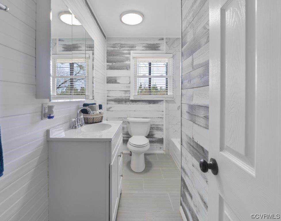 134 Ampthill Road Cartersville, VA 23027 - Photo 33 of 50 a bathroom with a granite countertop sink toilet and shower