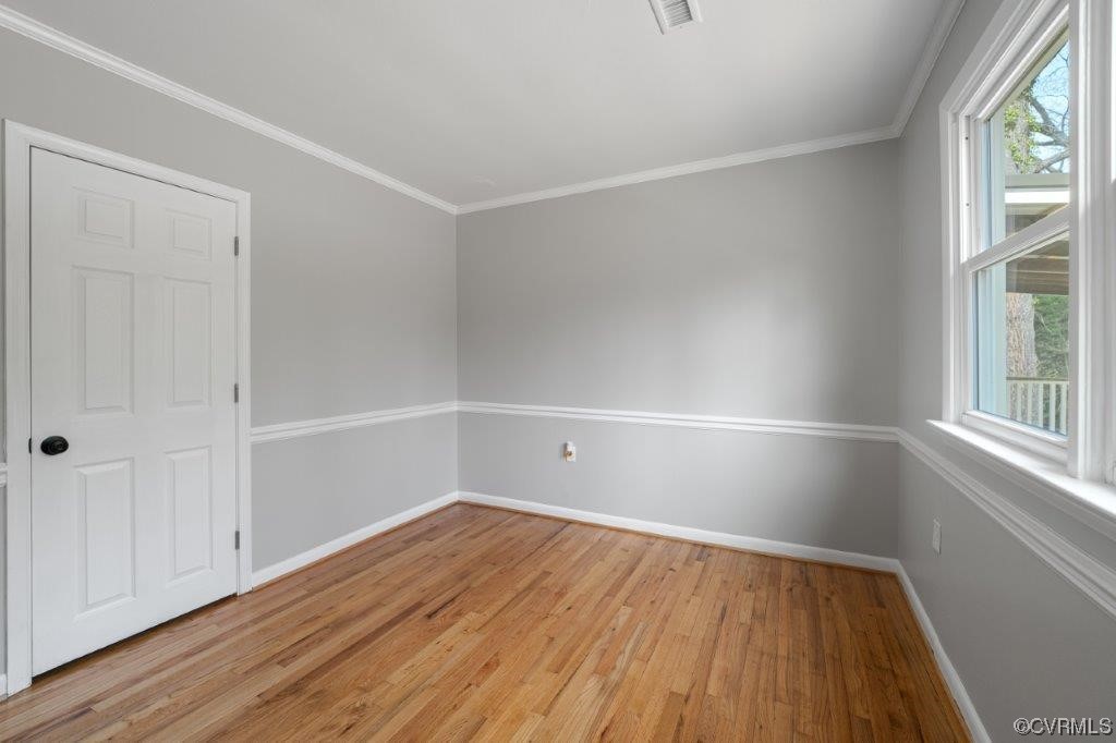 134 Ampthill Road Cartersville, VA 23027 - Photo 36 of 50 a view of empty room with wooden floor and fan