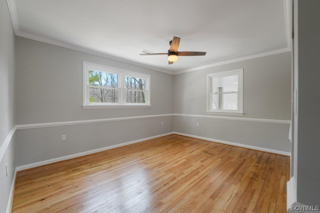 134 Ampthill Road Cartersville, VA 23027 - Photo 37 of 50 a view of an empty room with wooden floor and a window