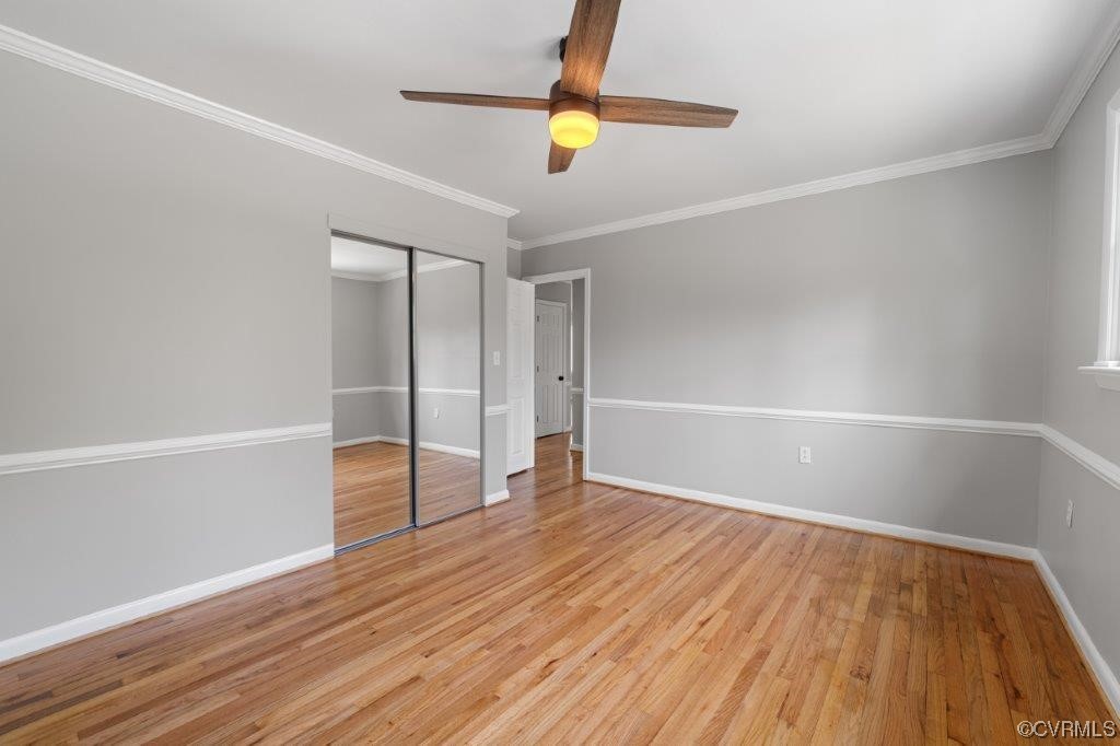 134 Ampthill Road Cartersville, VA 23027 - Photo 38 of 50 a view of an empty room with wooden floor and a window