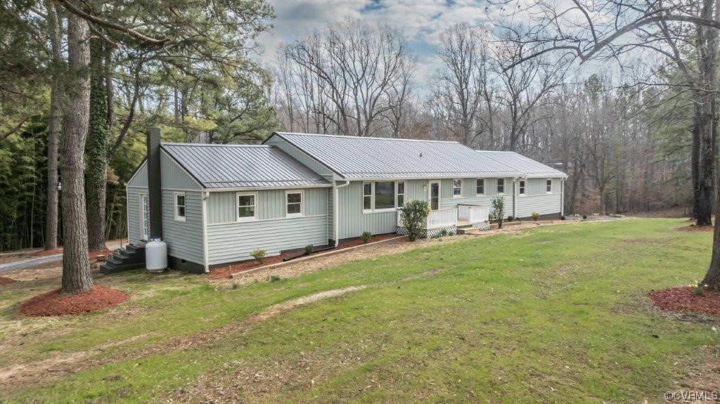 134 Ampthill Road Cartersville, VA 23027 - Photo 4 of 50 a view of a house with a yard