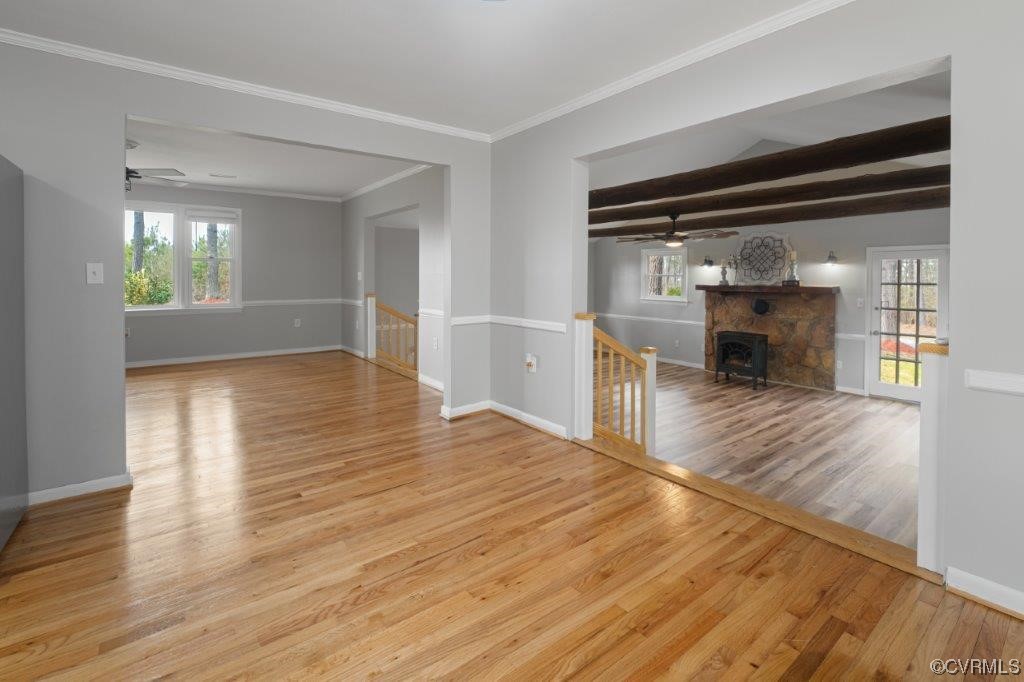 134 Ampthill Road Cartersville, VA 23027 - Photo 44 of 50 a view of empty room with wooden floor and fireplace