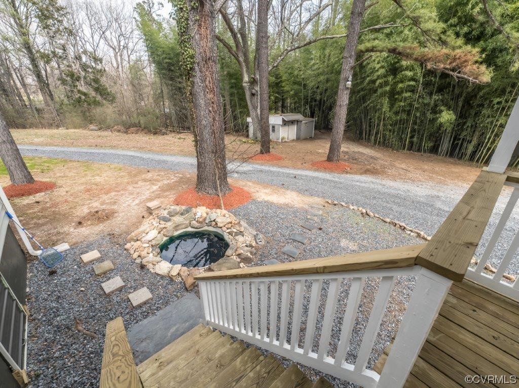 134 Ampthill Road Cartersville, VA 23027 - Photo 10 of 50 a view of a backyard with trees