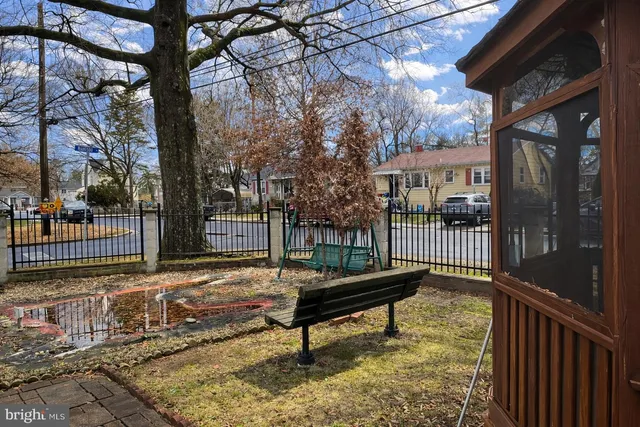 a bench sitting in front of a building