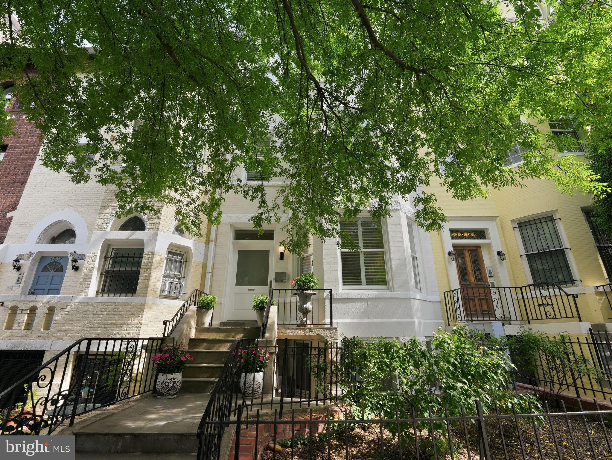 1845 Calvert Street Northwest Washington, DC 20009 - Photo 47 of 48 a front view of a house with outdoor seating