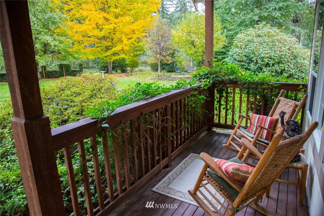 22705 Peter Grubb Road Southeast Renton, WA 98058 - Photo 3 of 40 a view of a two chair in the balcony
