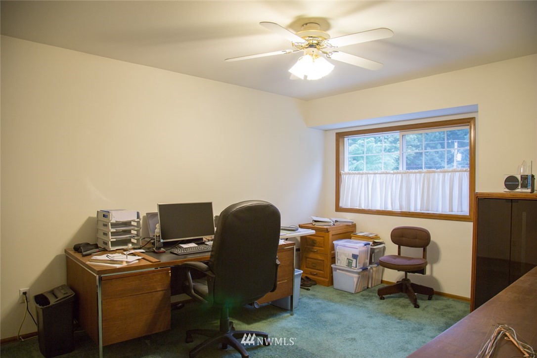 22705 Peter Grubb Road Southeast Renton, WA 98058 - Photo 21 of 40 a workspace with furniture and a window