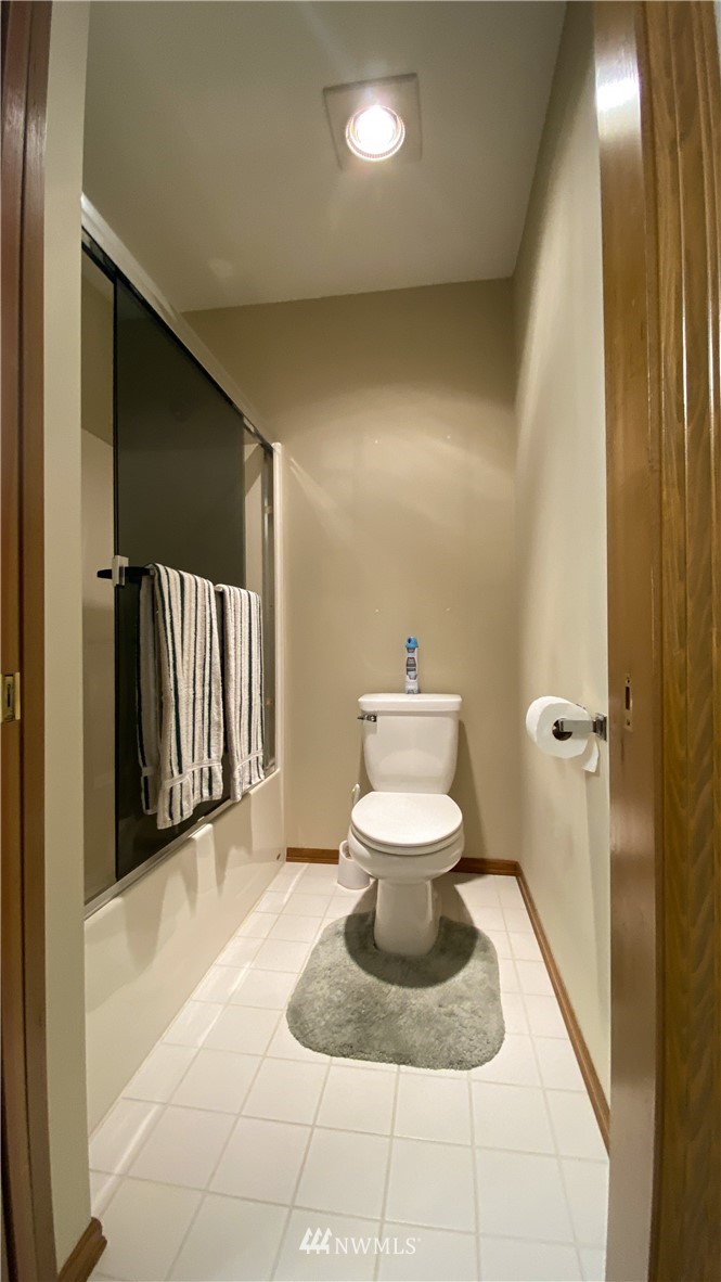 22705 Peter Grubb Road Southeast Renton, WA 98058 - Photo 23 of 40 a bathroom with a sink and toilet