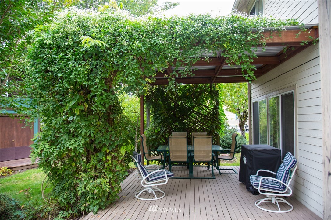 22705 Peter Grubb Road Southeast Renton, WA 98058 - Photo 26 of 40 a view of balcony with furniture and a grill