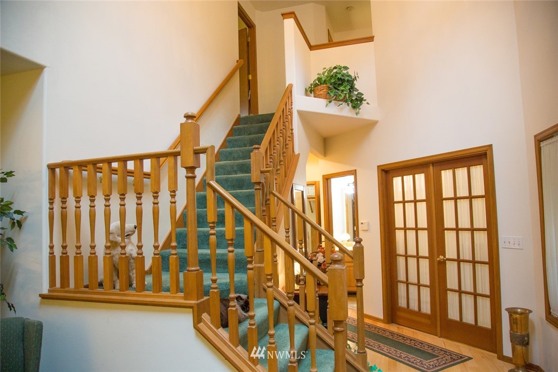 22705 Peter Grubb Road Southeast Renton, WA 98058 - Photo 4 of 40 a view of entryway with a front door