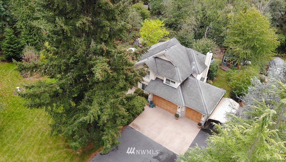 22705 Peter Grubb Road Southeast Renton, WA 98058 - Photo 40 of 40 an aerial view of a house with garden space and street view