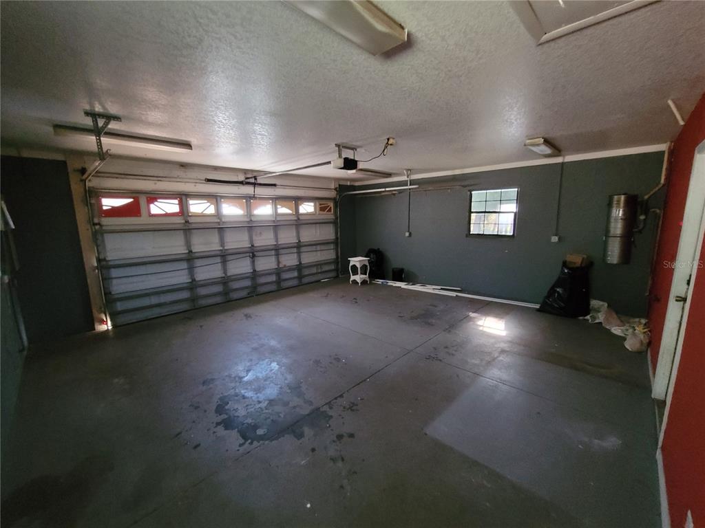 37515 Phelps Road Zephyrhills, FL 33541 - Photo 13 of 25 a view of a room with gym equipment