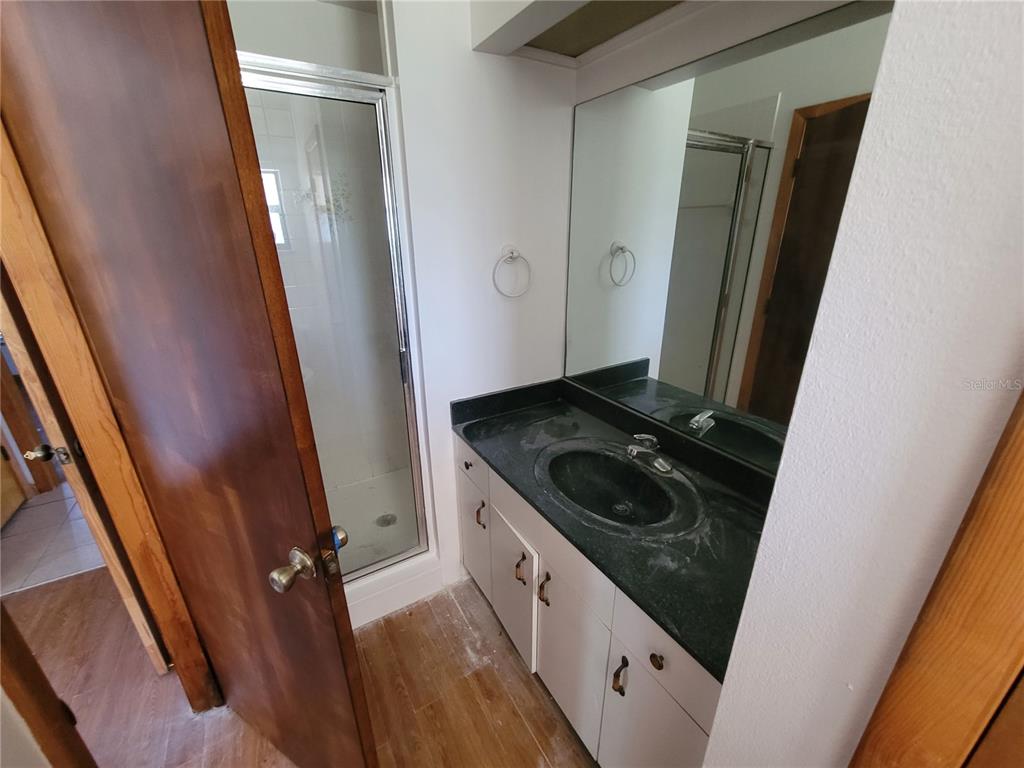 37515 Phelps Road Zephyrhills, FL 33541 - Photo 19 of 25 a kitchen with a sink stove and refrigerator