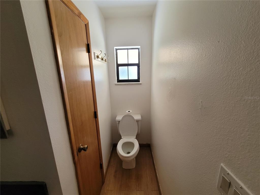 37515 Phelps Road Zephyrhills, FL 33541 - Photo 20 of 25 a bathroom with a toilet