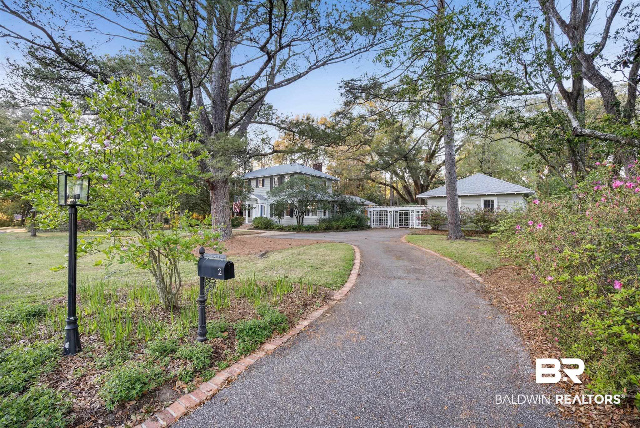 2 Westgate Road Mobile, AL 36608 - Photo 44 of 63 View of front facade with driveway