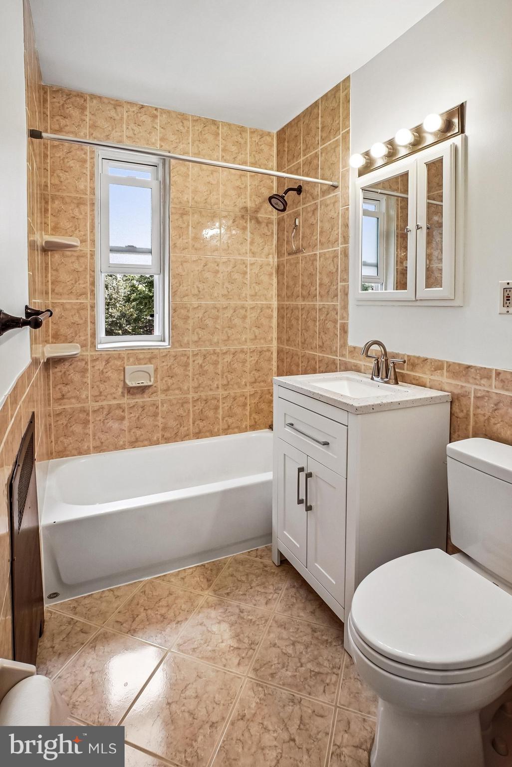 4312 2nd Road North, Unit 2 Arlington, VA 22203 - Photo 25 of 66 Bright and modern bathroom retreat.