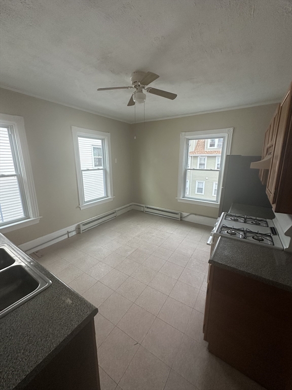 53 Bank Attleboro, MA 02703 - Photo 2 of 7 a view of an empty room with a window