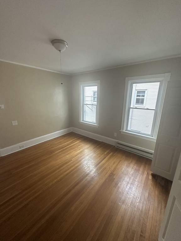 53 Bank Attleboro, MA 02703 - Photo 4 of 7 a view of a room with wooden floor and window