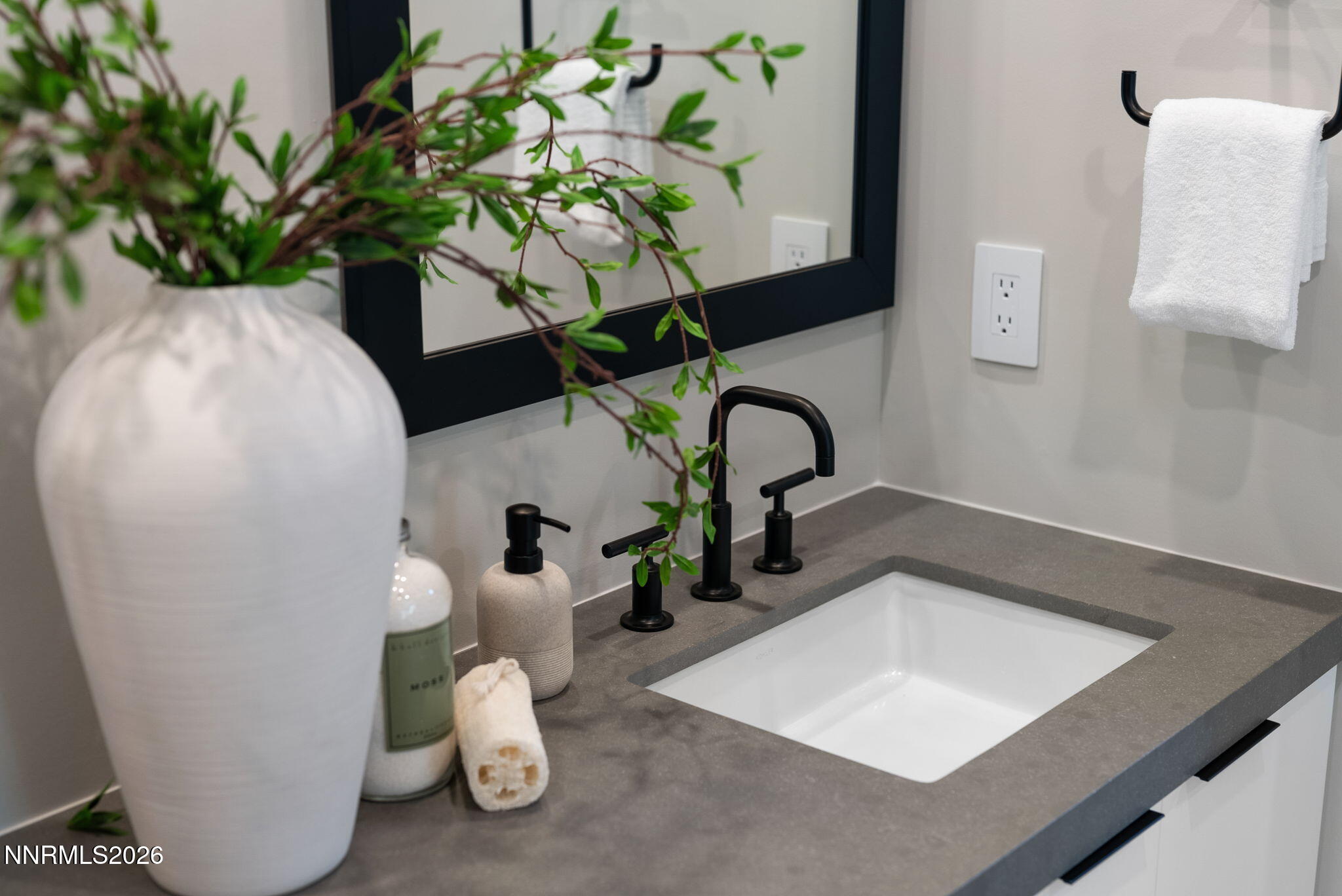 77 Caballada Street Reno, NV 89511 - Photo 38 of 55 a bathroom with a sink a toilet and mirror