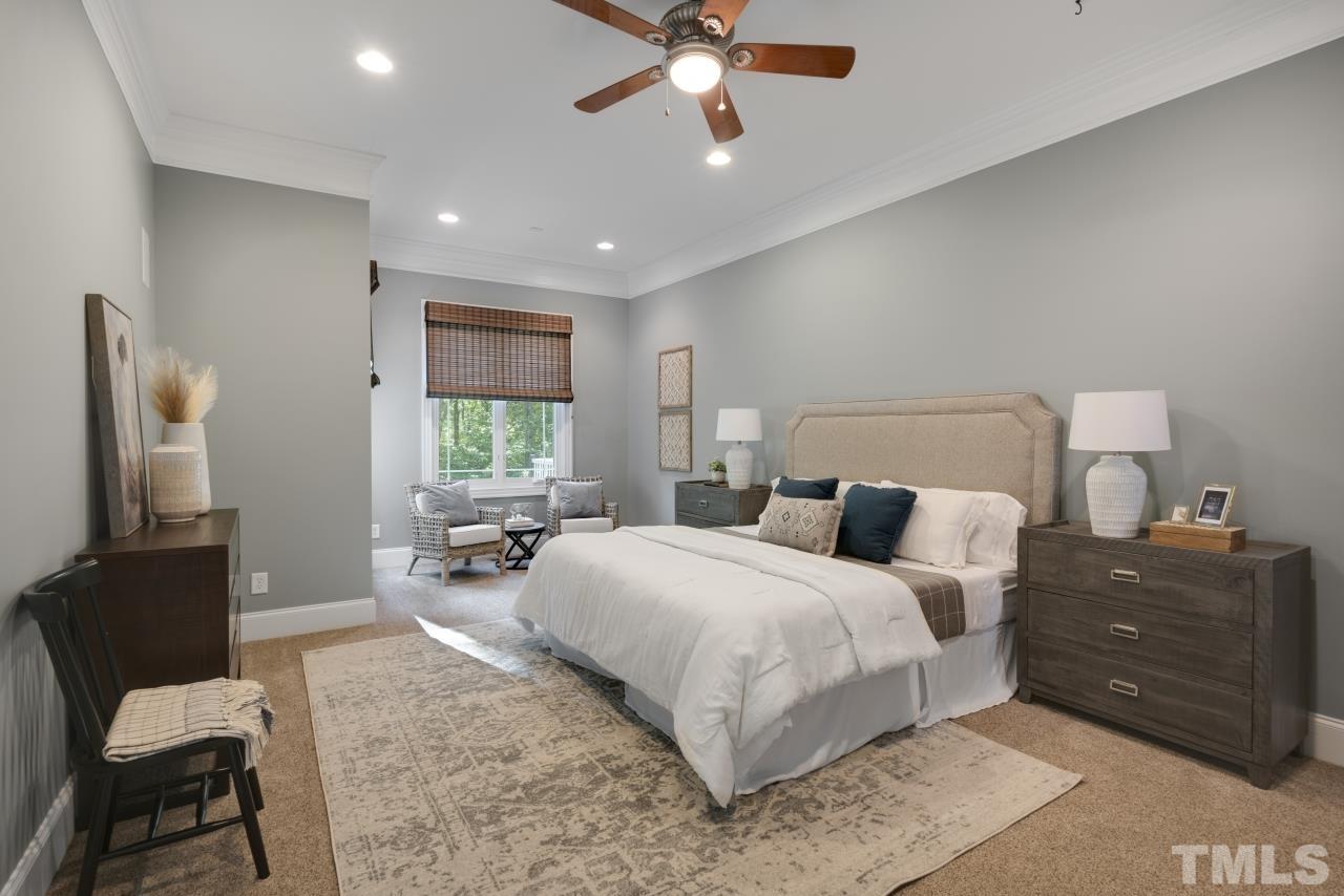 5909 Greenevers Drive Raleigh, NC 27613 - Photo 14 of 30 a bedroom with a bed and window