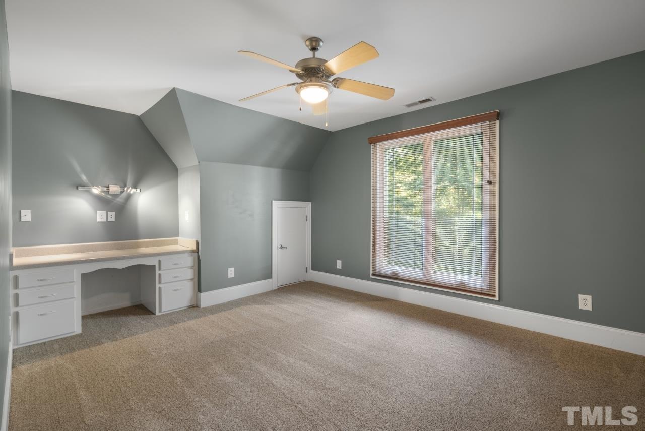 5909 Greenevers Drive Raleigh, NC 27613 - Photo 22 of 30 a view of an empty room with a window