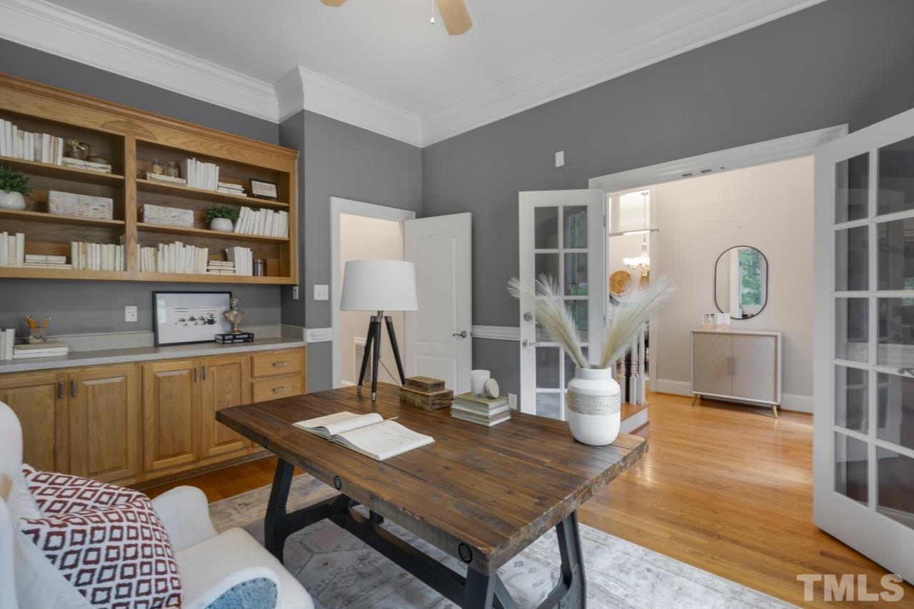 5909 Greenevers Drive Raleigh, NC 27613 - Photo 3 of 30 a view of a workspace with furniture