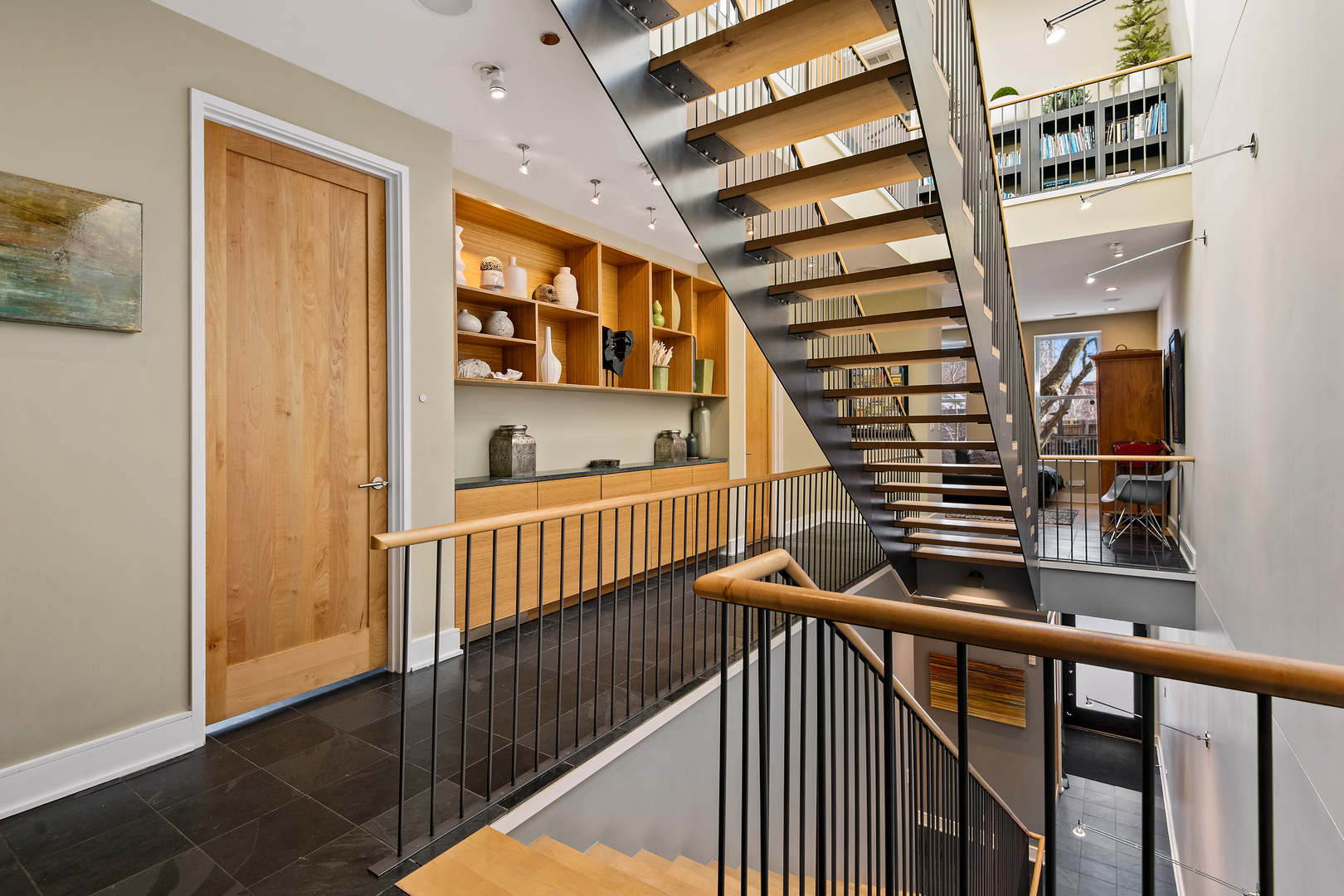 1708 North Mohawk Street Chicago, IL 60614 - Photo 2 of 33 a view of staircase with railing and white walls