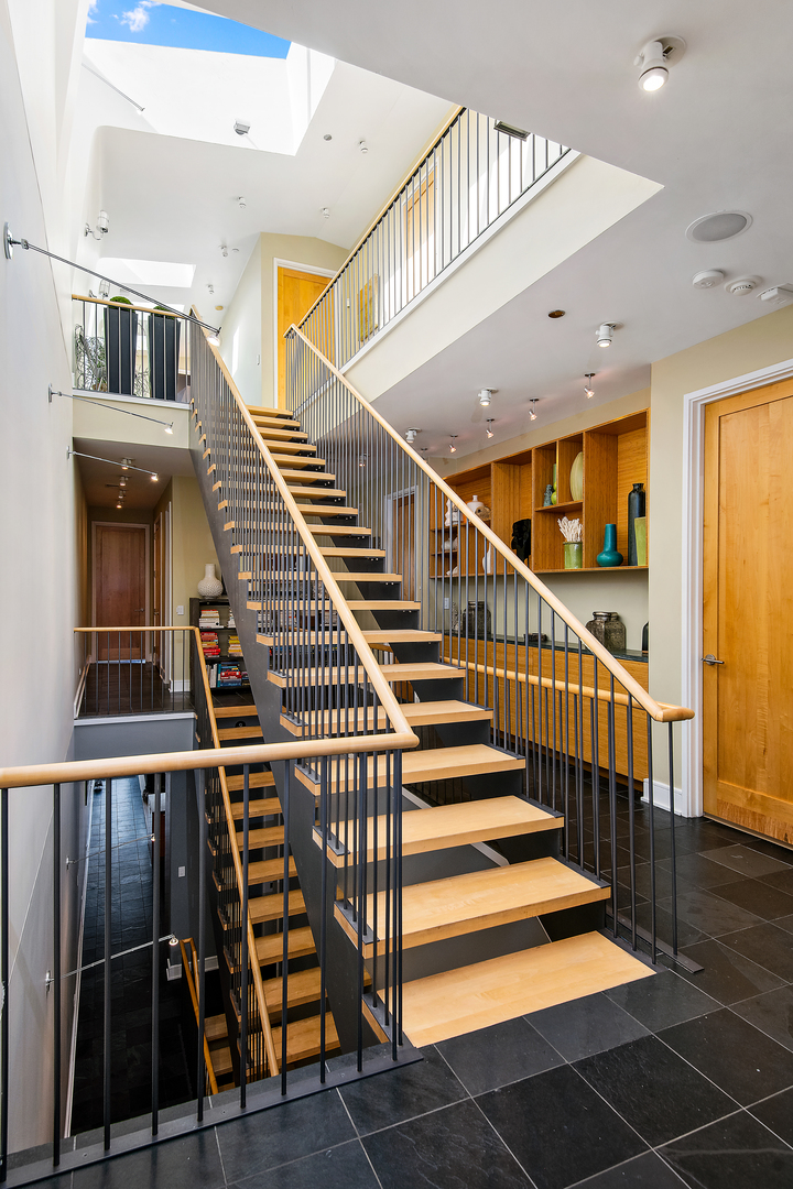 1708 North Mohawk Street Chicago, IL 60614 - Photo 22 of 33 a view of entryway and hall with wooden floor