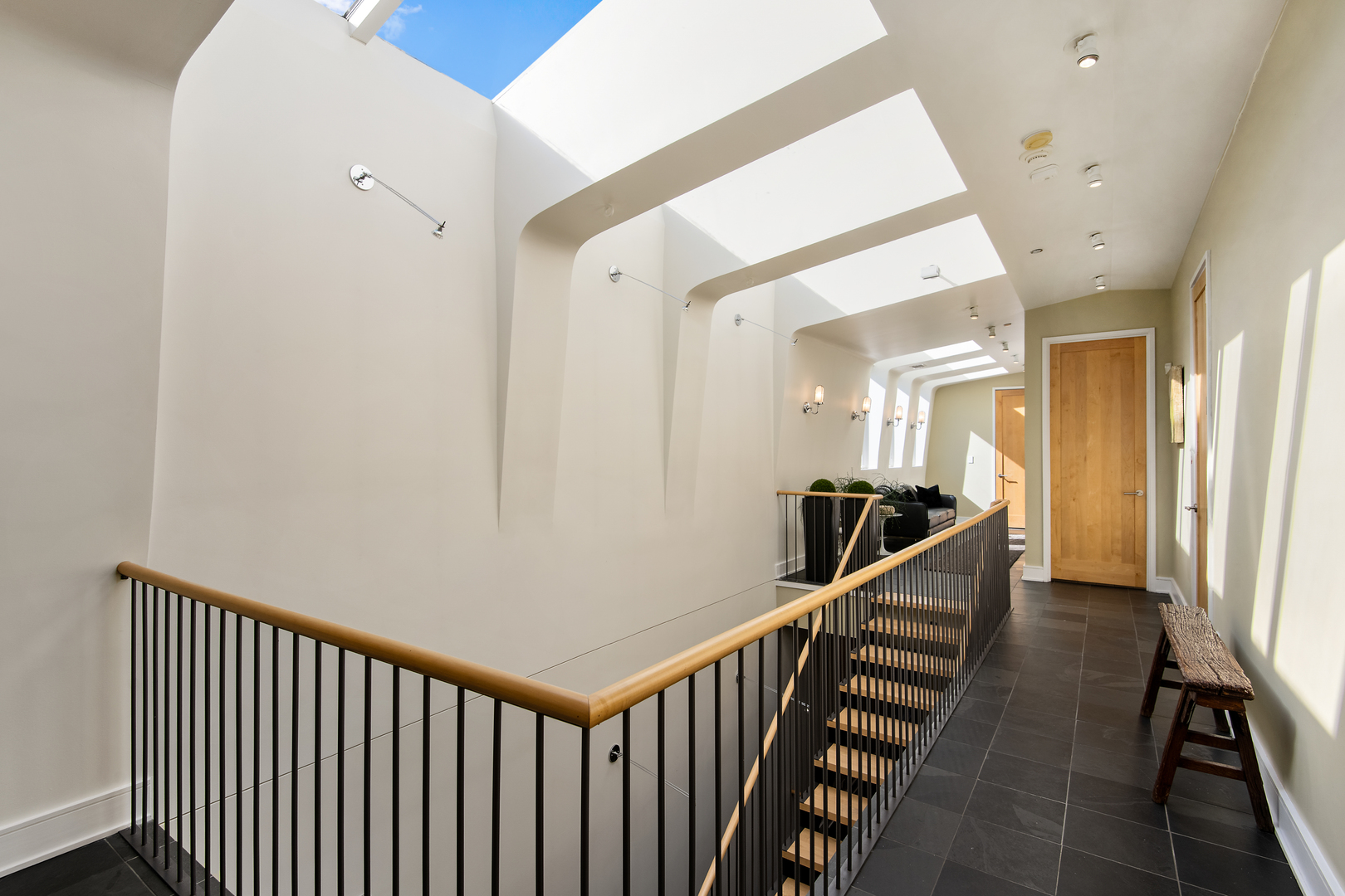 1708 North Mohawk Street Chicago, IL 60614 - Photo 25 of 33 a view of a hallway with wooden floor and stairs