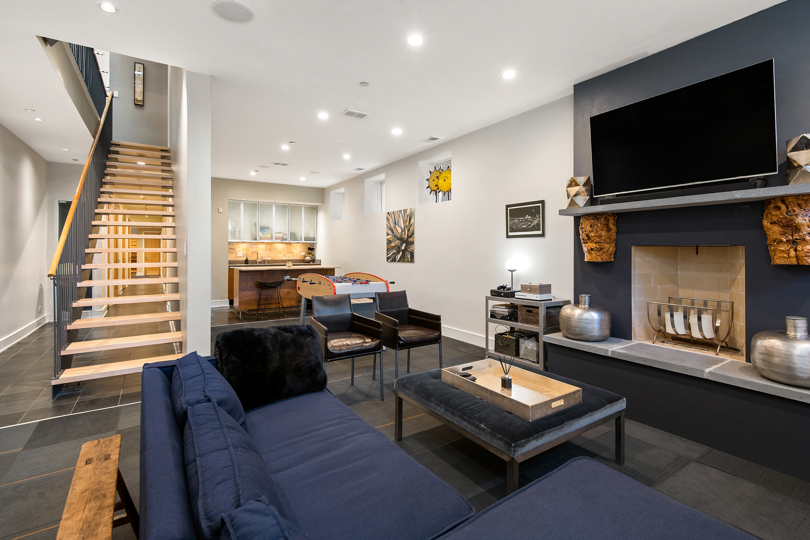 1708 North Mohawk Street Chicago, IL 60614 - Photo 26 of 33 a living room with furniture a flat screen tv and kitchen view