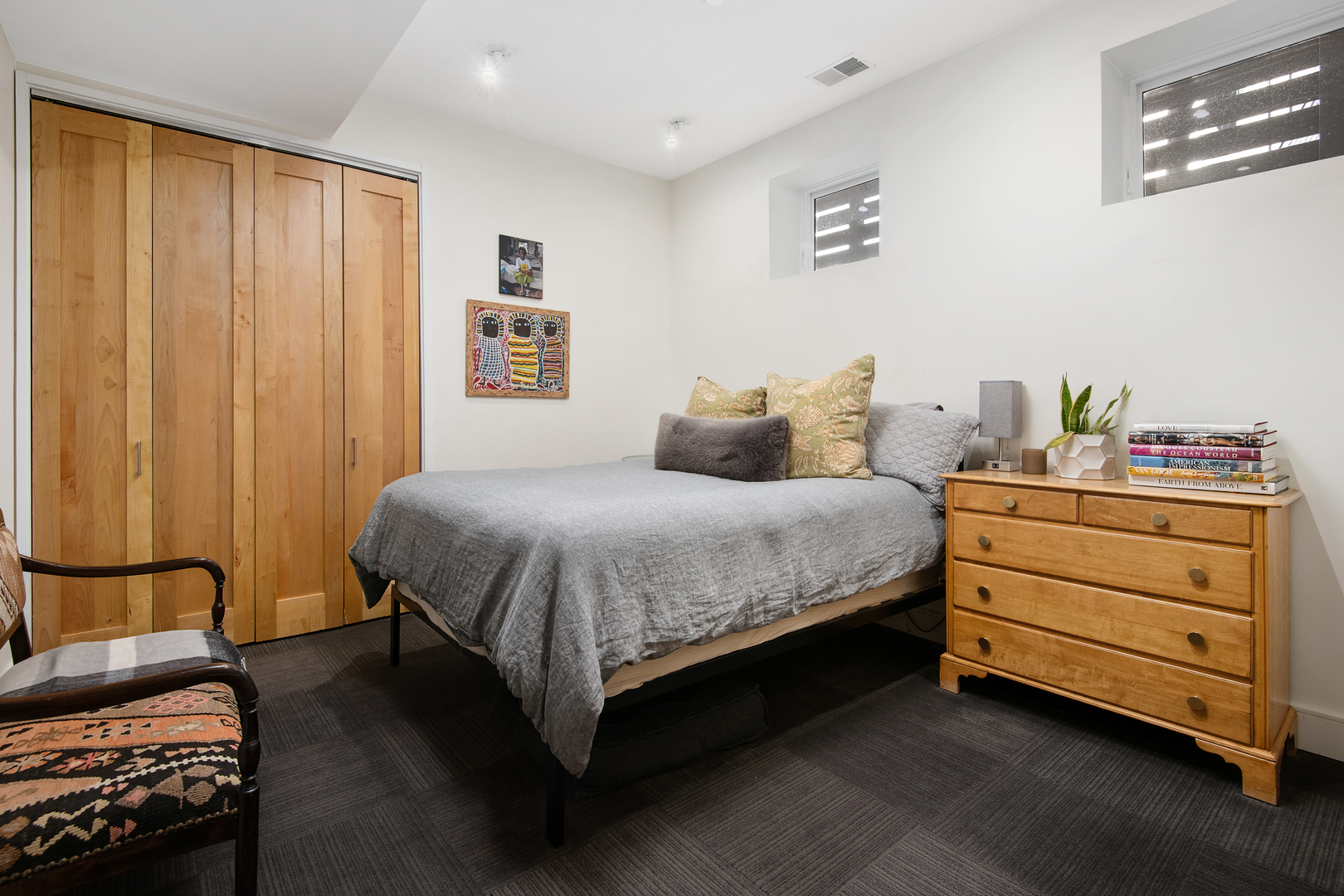 1708 North Mohawk Street Chicago, IL 60614 - Photo 28 of 33 a bedroom with a bed and a dresser