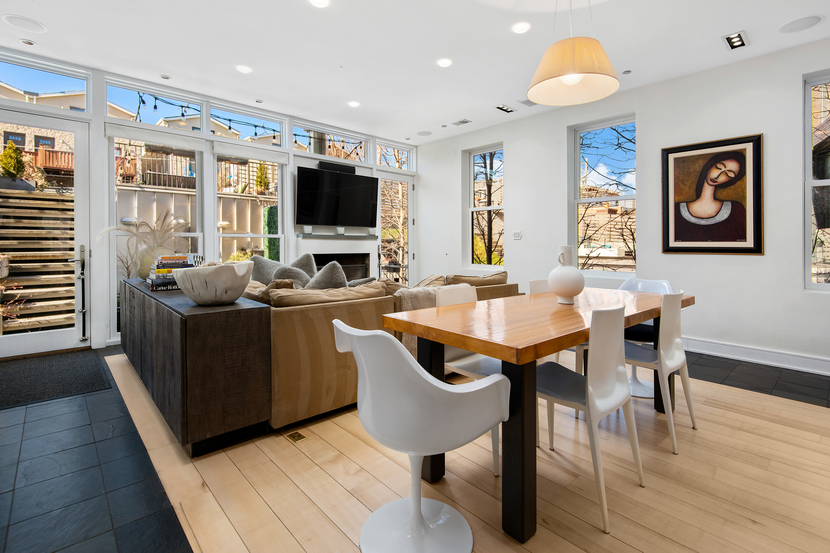 1708 North Mohawk Street Chicago, IL 60614 - Photo 6 of 33 a living room with furniture a flat screen tv and a large window