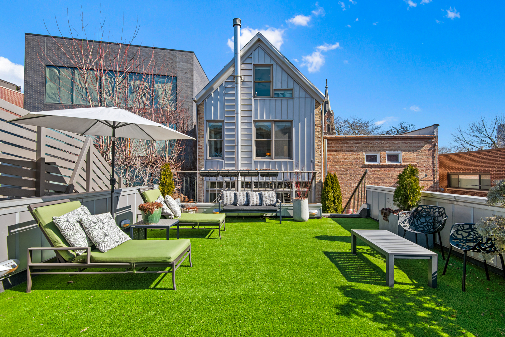 1708 North Mohawk Street Chicago, IL 60614 - Photo 10 of 33 a view of a chair and table in backyard of the house