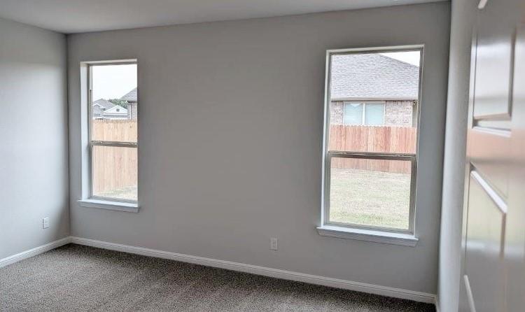 956 Traction Trail Cleburne, TX 76031 - Photo 4 of 15 an empty room with windows and closet